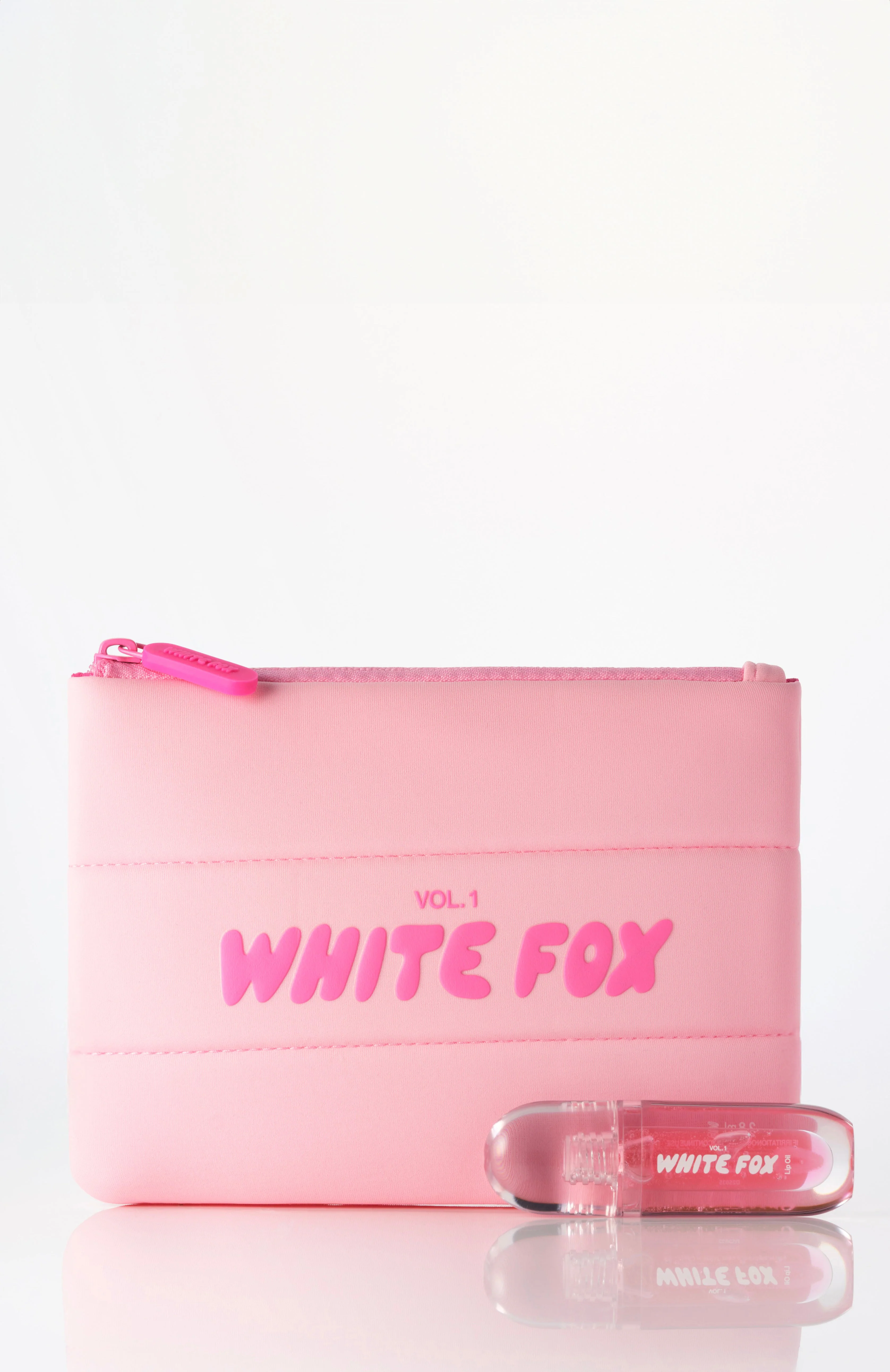 The Cosmetic Pouch & Lip Oil